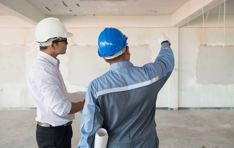 Close-up view of asbestos roofing sheets on an industrial building.