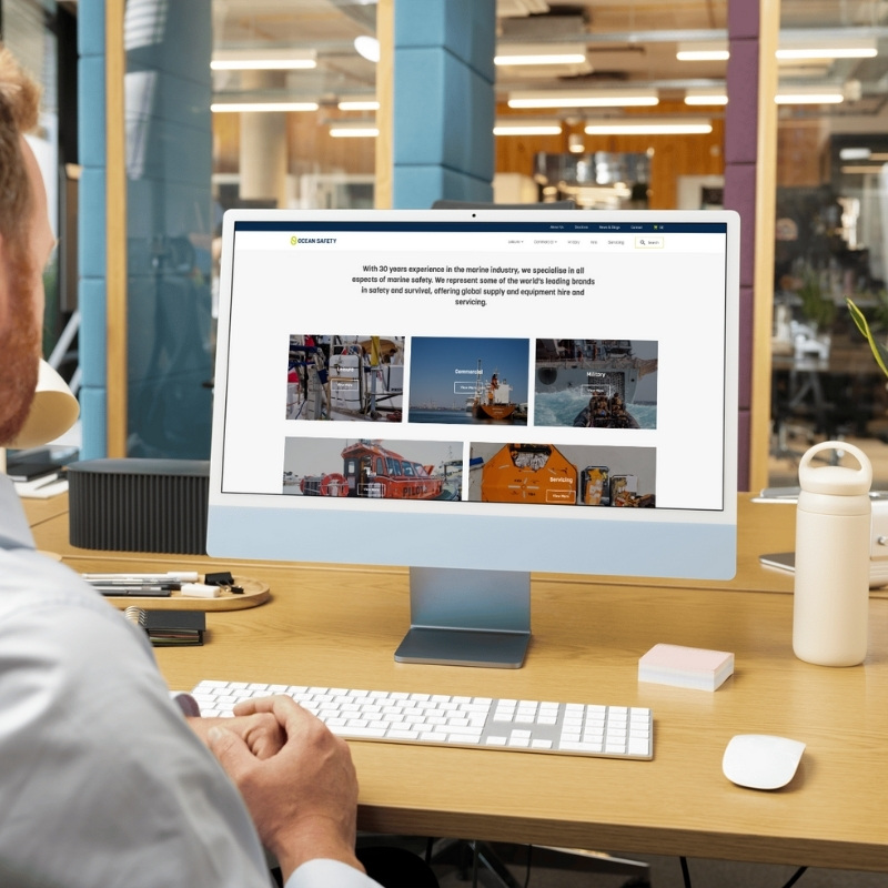 Computer screen mockup showing the Ocean Safety website design.