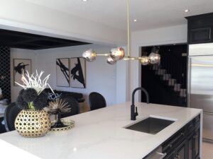 Modern interior space with sleek kitchen and dining area.