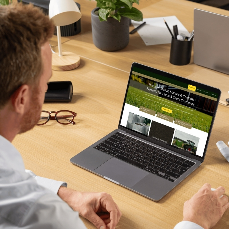 Laptop mockup showcasing the Alsoils website homepage design.