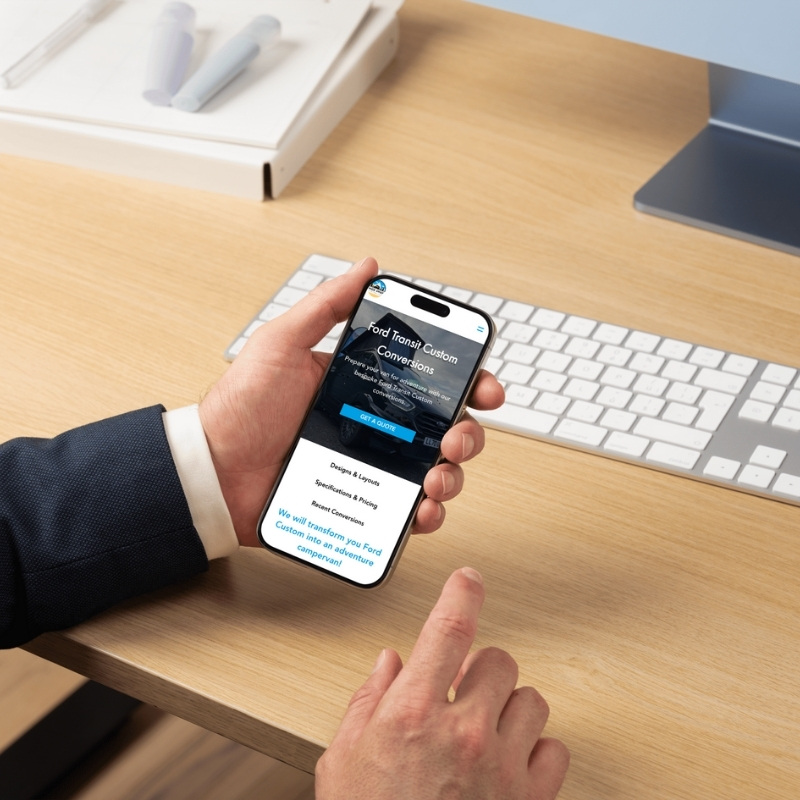 Mobile phone mockup displaying the Hideaway Campervans website homepage.