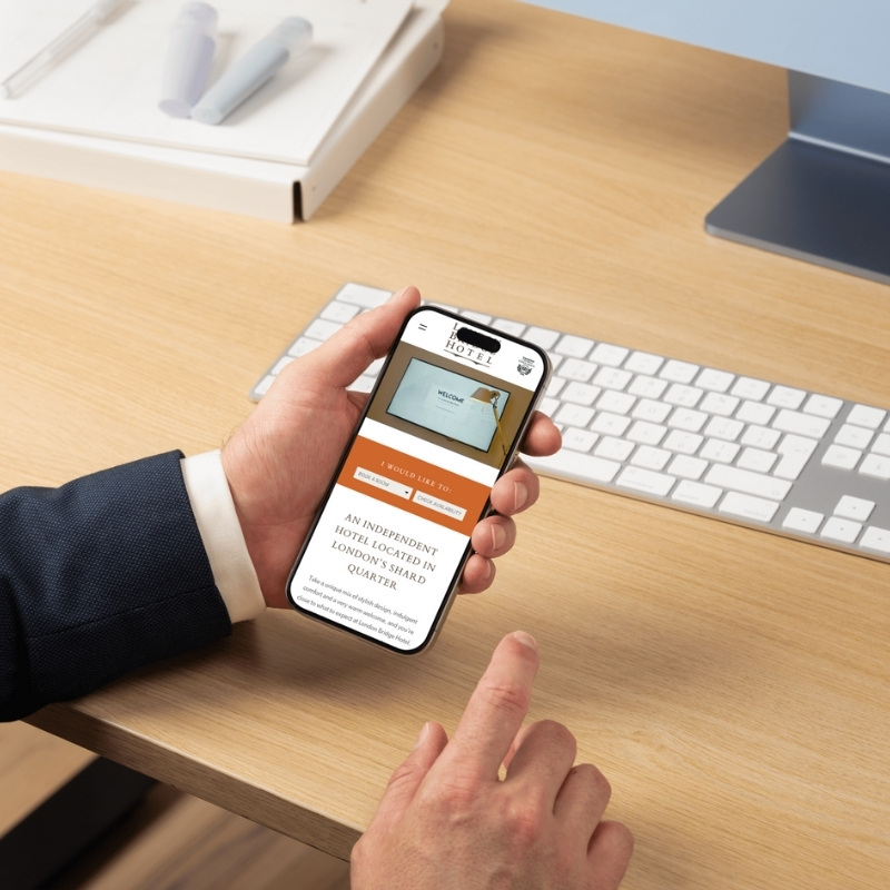 Mobile phone mockup displaying the London Bridge Hotel website homepage.
