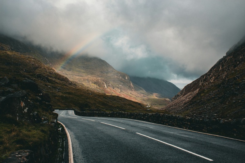 Scenic winding road through the mountains of Wales.